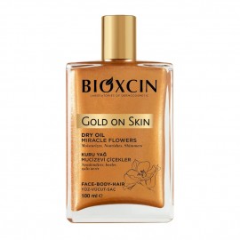 روغن مرطوب کننده و شاین دار پوست و مو بیوکسین Gold On Skin