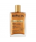 روغن مرطوب کننده و شاین دار پوست و مو بیوکسین Gold On Skin